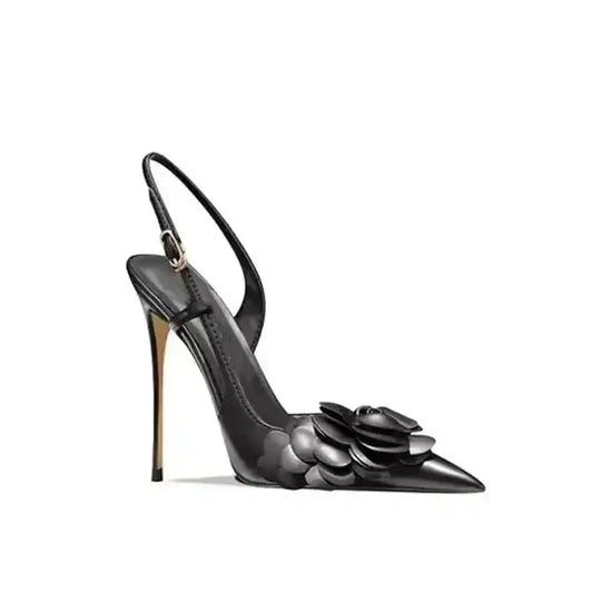 Side profile of black Petal Pirouette Slingback Heels with floral toe design and high stiletto heel, exclusive at FashionFitz.