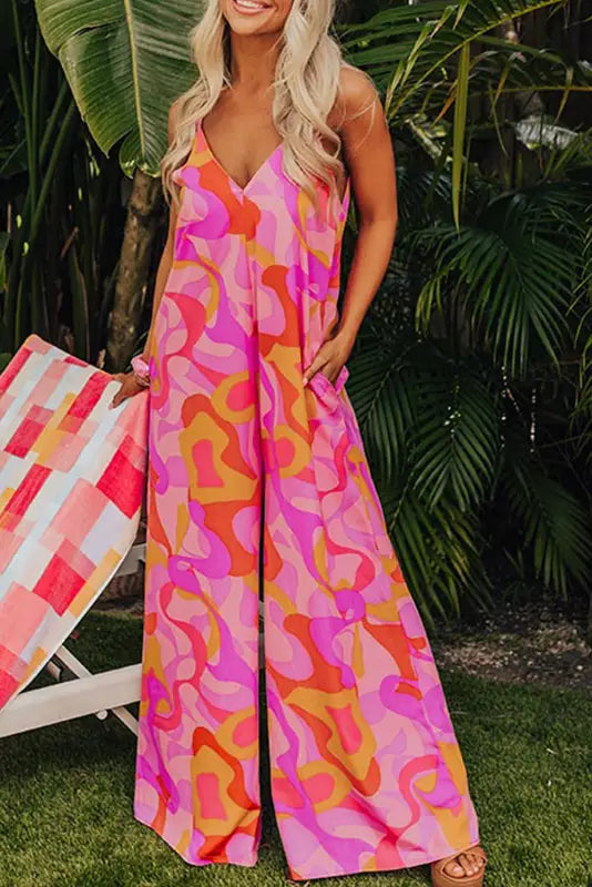 Pink boho wide-leg jumpsuit with vibrant abstract print and spaghetti straps - relax relax