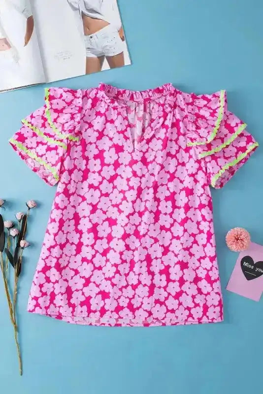 Close-up of Pink Floral Layered Ruffle Sleeve Blouse showing contrast ric-rac braid trim and vibrant pink floral cotton fabric — Fashionfitz