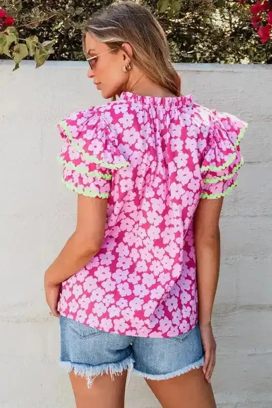 Back view of Pink Floral Layered Ruffle Sleeve Blouse showing contrast ric-rac trim and V-neckline — Fashionfitz