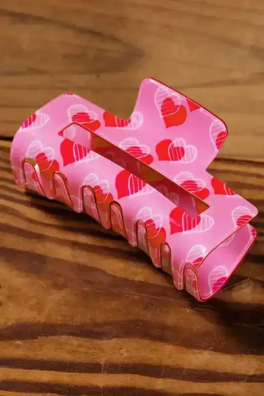 Close-up of Pink Hearts Valentines Fashion Hair Claw by Fashionfitz, featuring a glossy finish and bold heart pattern.
