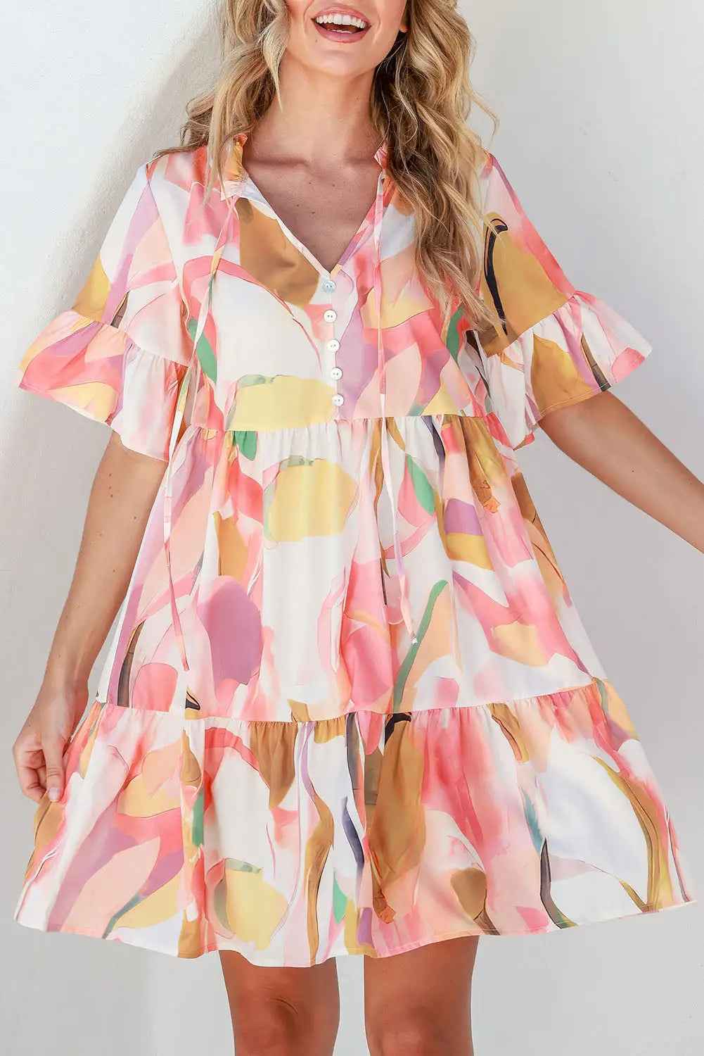 Pink geometric print ruffled short sleeve tied v-neck mini dress - s / 95% polyester + 5% elastane - dresses
