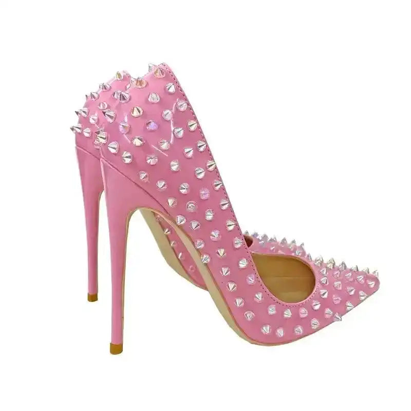Back angle of FashionFitz Pink Studded Court Heels with sharp stiletto heels and edgy silver embellishments for a bold fashion statement.