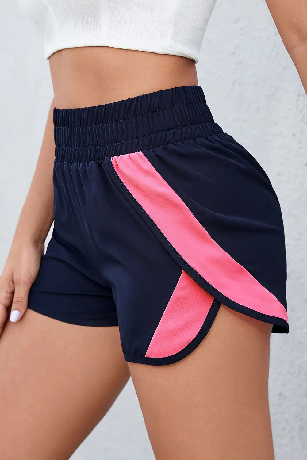 Pink smocked elastic waist athletic shorts