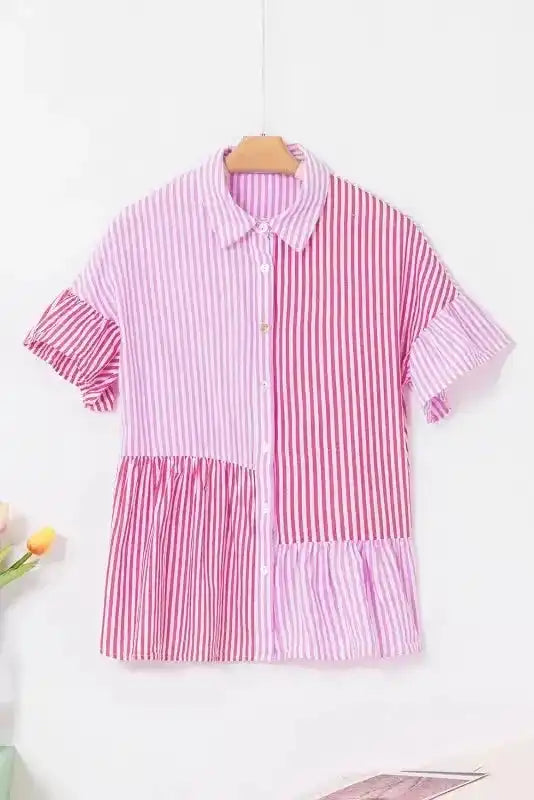 Flat lay of Pink Stripe Patchwork Ruffled Hem Shirt on hanger, showcasing bold vertical stripes and tiered ruffle accents.
