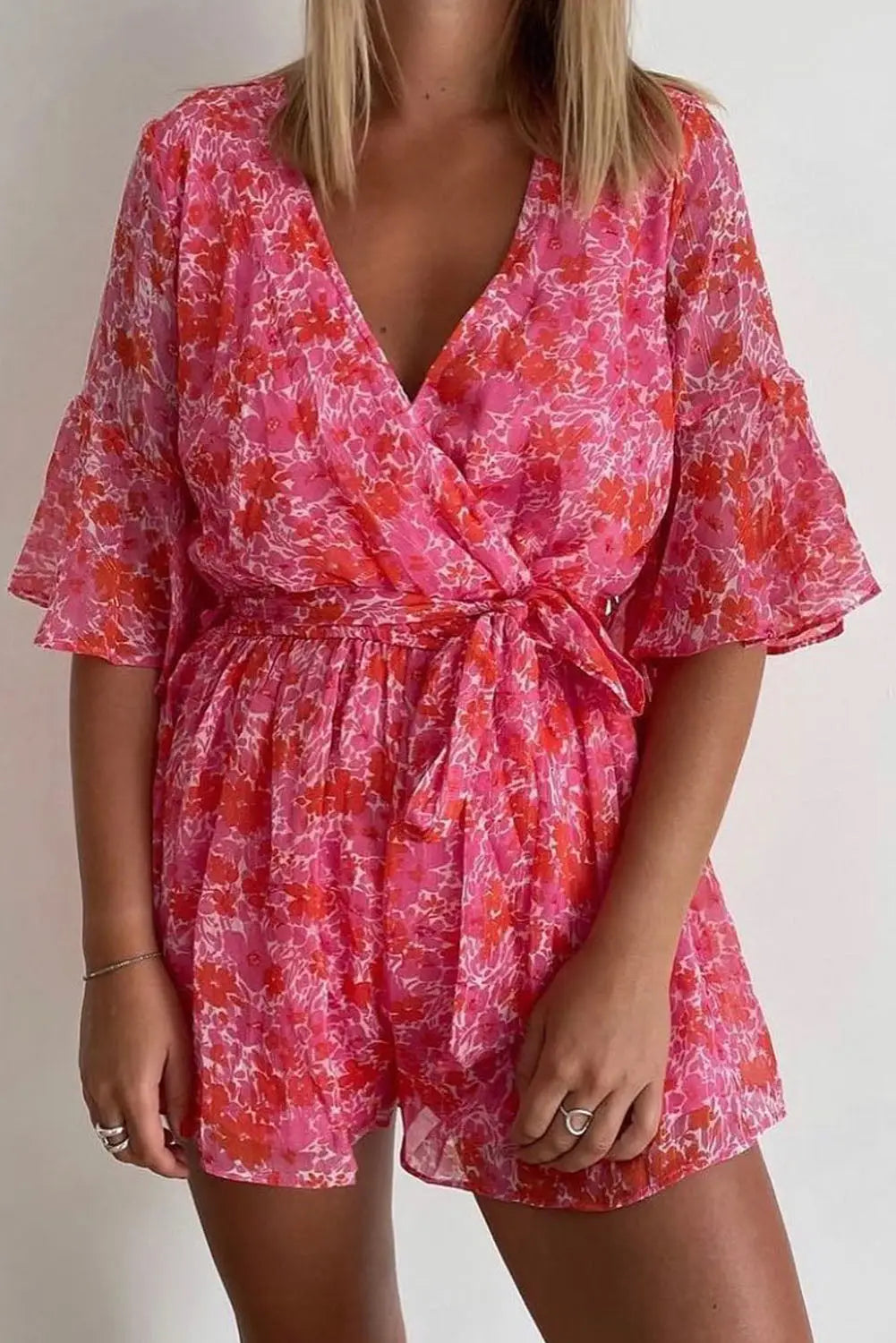 Pink v neck ruffled sleeve floral romper - s / 100% polyester - jumpsuits & rompers