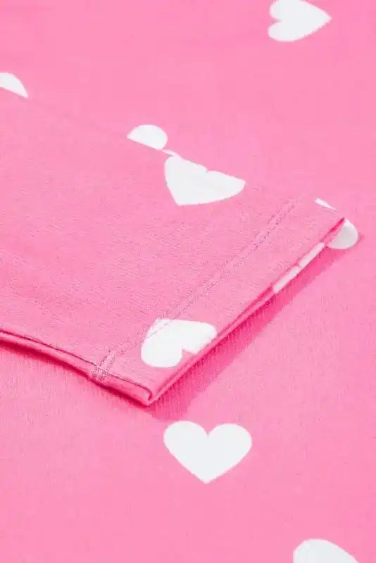Sleeve detail of Pink Valentine Lounge Set tee with white heart prints, showcasing soft fabric and neat stitching.