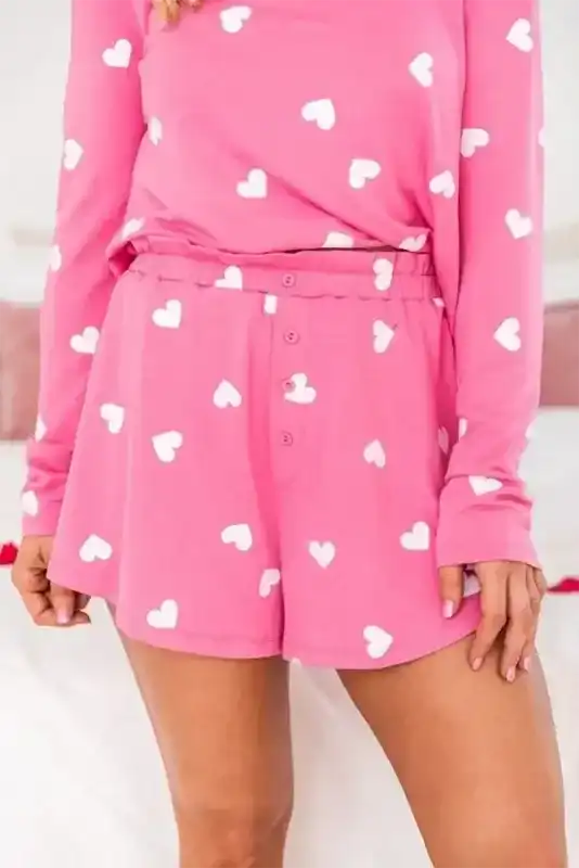 Close-up of Pink Valentine Lounge Set shorts with button details and heart print, part of a soft and stylish loungewear set.