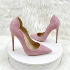 Luxury Pumps - Pink Velvet High Heels Stiletto Shoes displayed on round pedestal with faux fur background. Chic and feminine footwear choice.