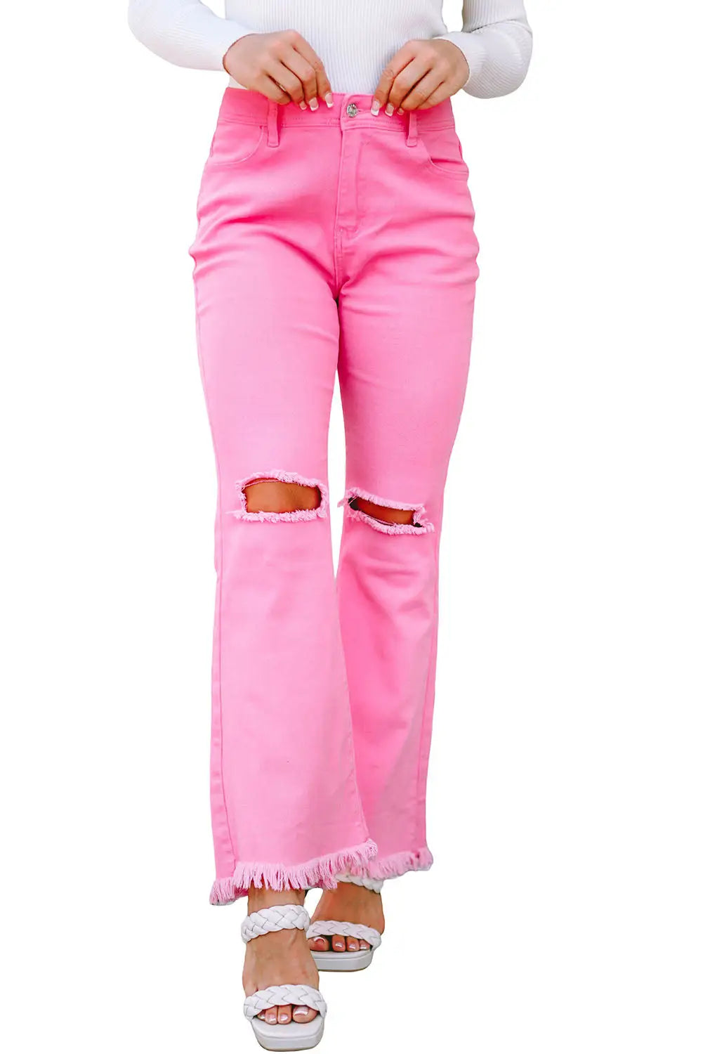 Pink vintage high waist flare leg ripped raw hem jeans