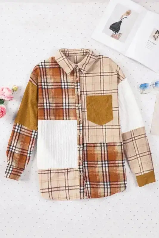 Flat lay of the Ladies Plaid Color Block Patchwork Shacket showing button-up front and contrasting fabric panels.