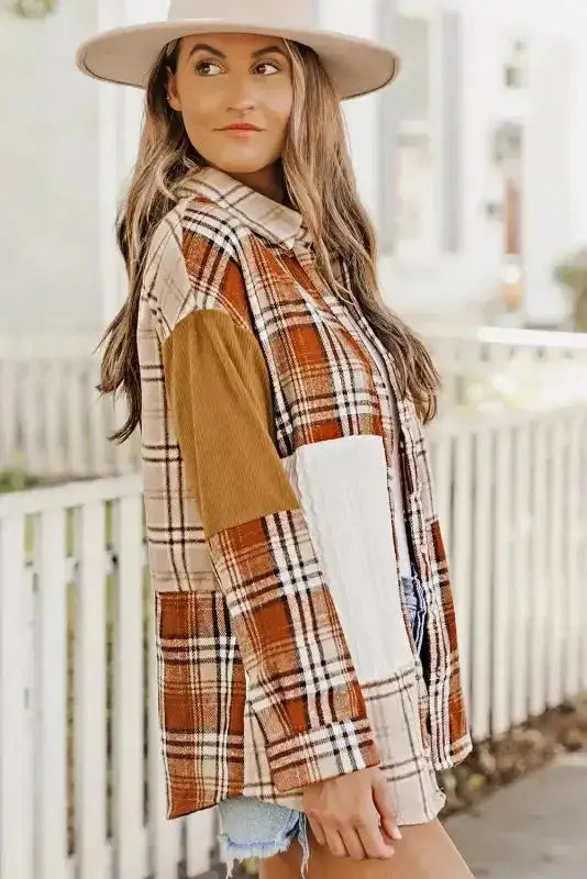 Side profile of the women's plaid patchwork shacket featuring corduroy sleeves and a relaxed fit for casual fall wear.
