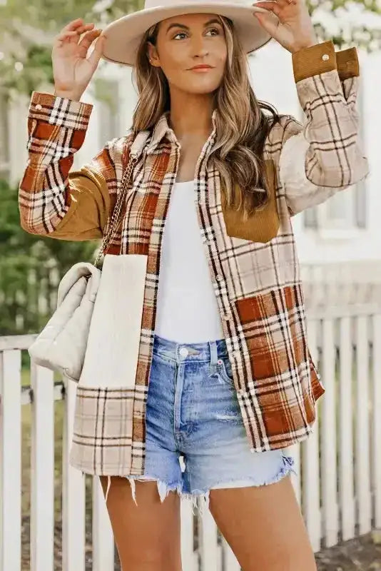 Model wearing the Ladies Plaid Color Block Patchwork Shacket with a white top and hat, perfect for autumn layering.