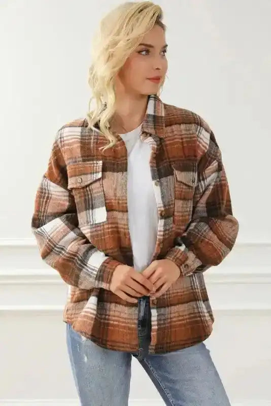 Classic plaid shacket with flap pockets and button closure, styled for fall fashion essentials.