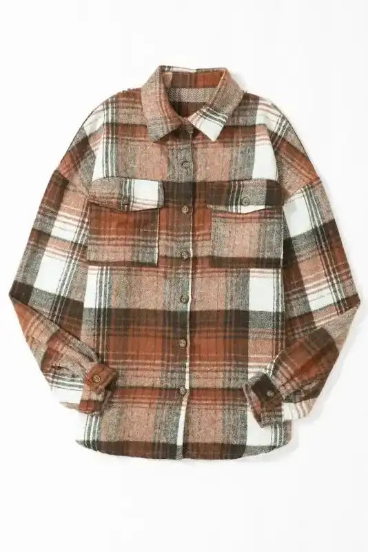 Flat lay of stylish plaid shacket with flap pockets, showcasing button details and fall color palette.