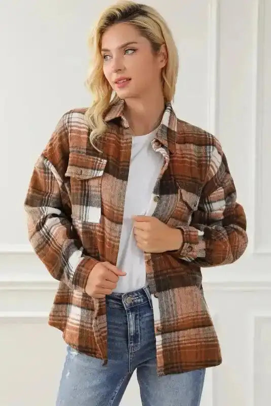 Model in plaid shacket flap pockets with button-up front, ideal for cozy fall and autumn wear.
