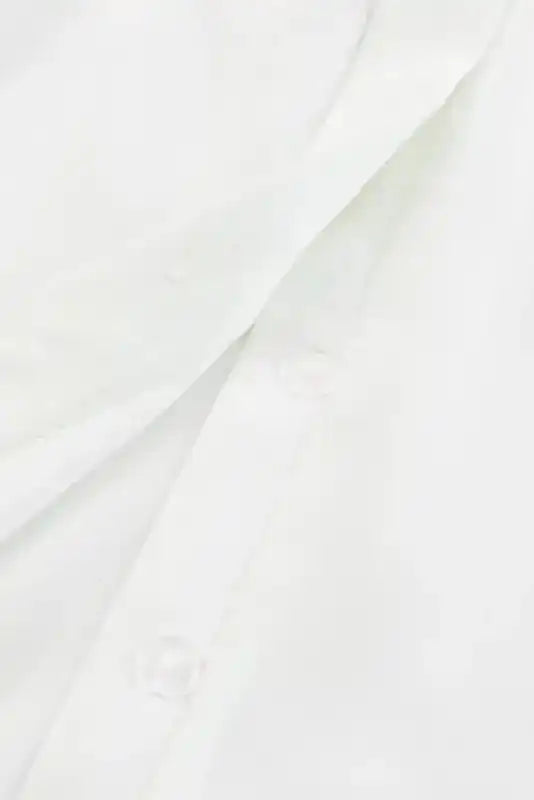 Close-up of hidden button placket on the Pleated Neck Stretch Cuff Shirt, adding a sleek and polished finish to the blouse.