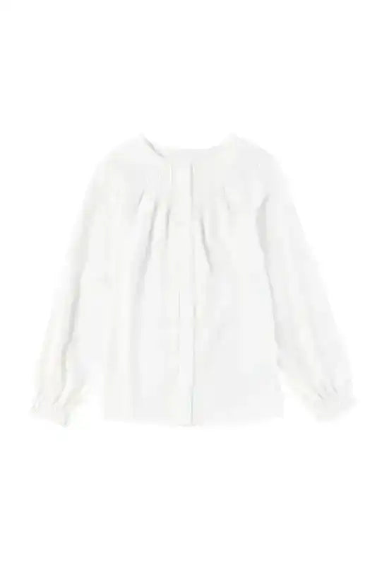 Studio shot of Pleated Neck Stretch Cuff Shirt on white background, emphasizing its minimalist design and versatile style.