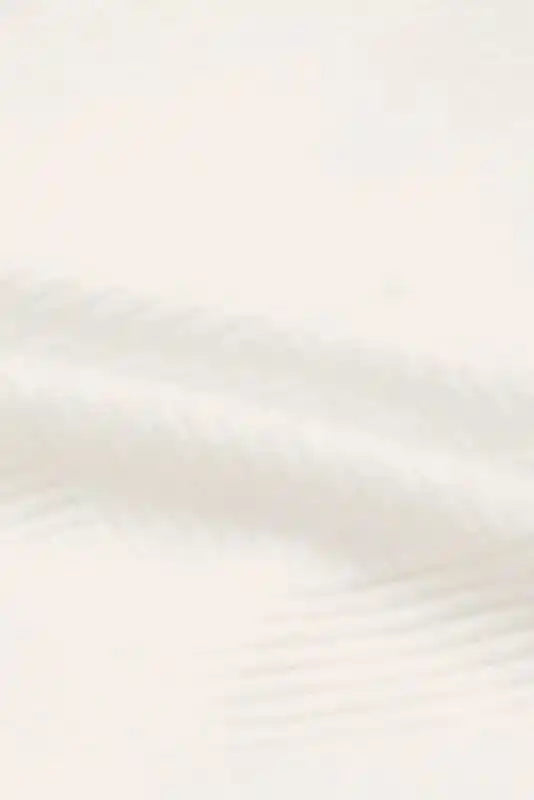 Zoomed-in texture of the plus size jacket fabric, emphasizing the ribbed pattern and cozy winter material.