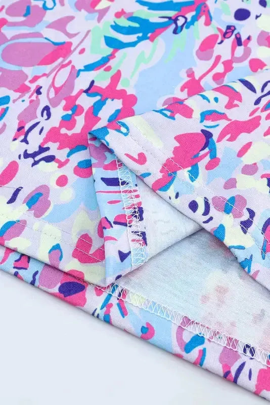 Close-up of abstract floral print and high stretch fabric on sleeveless maxi dress Fashionfitz UK