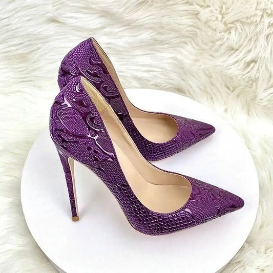 Purple embossed stiletto pumps