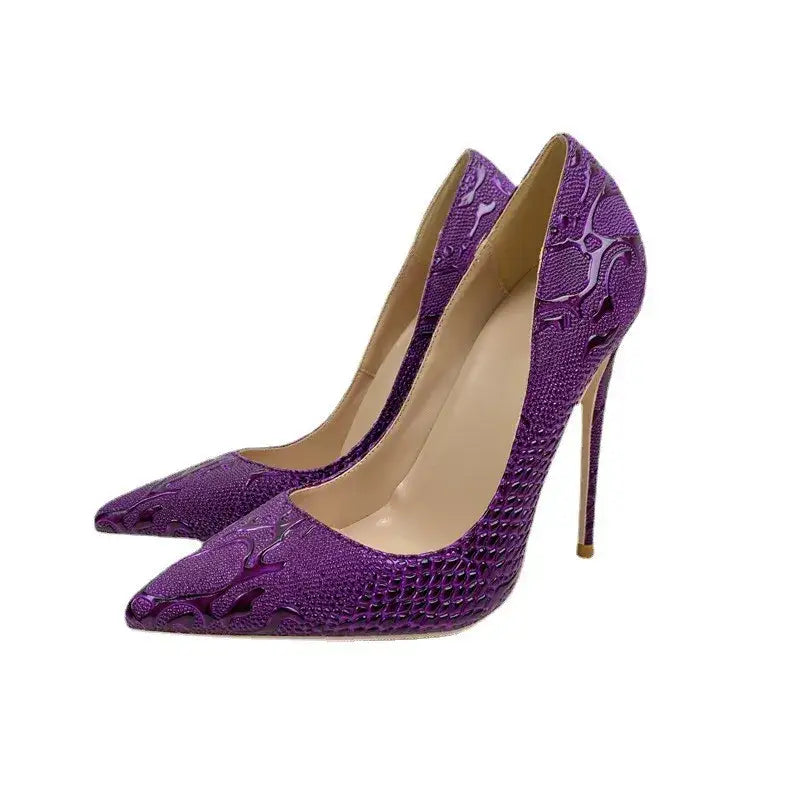 Purple embossed stiletto pumps