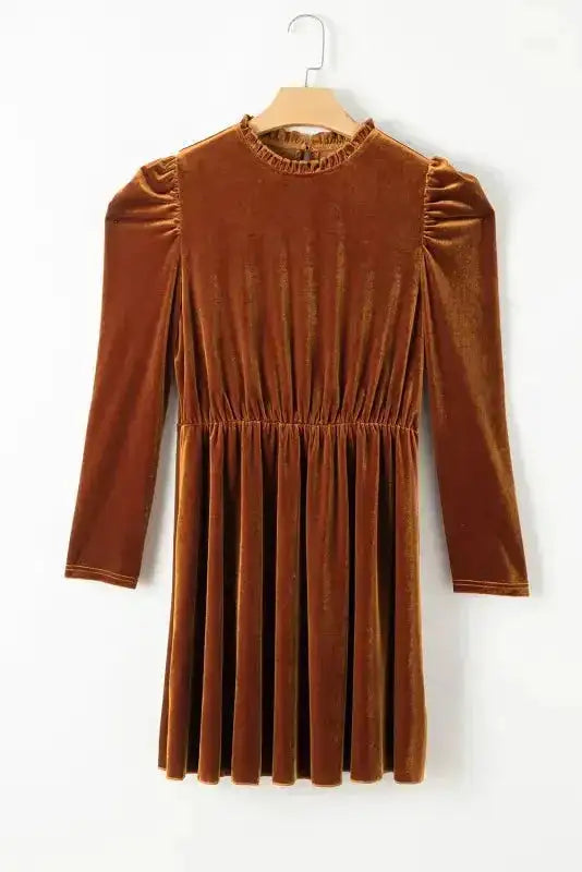 Chestnut velvet swing dress on hanger showing A-line silhouette, frilled neckline, and long puff sleeves for elegant styling.