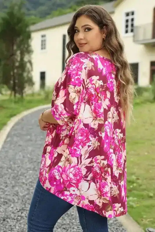 Side view of Red Floral Short Sleeve Plus Size Blouse showing relaxed shift fit and red floral print — Fashionfitz