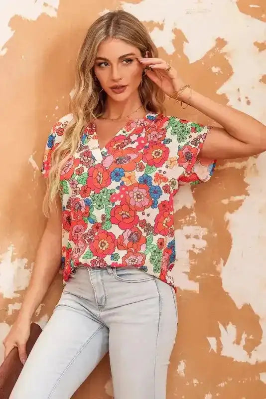 Close-up of Floral Split Neck Short Sleeve Top showing vibrant red floral print and split V-neck detail — Fashionfitz