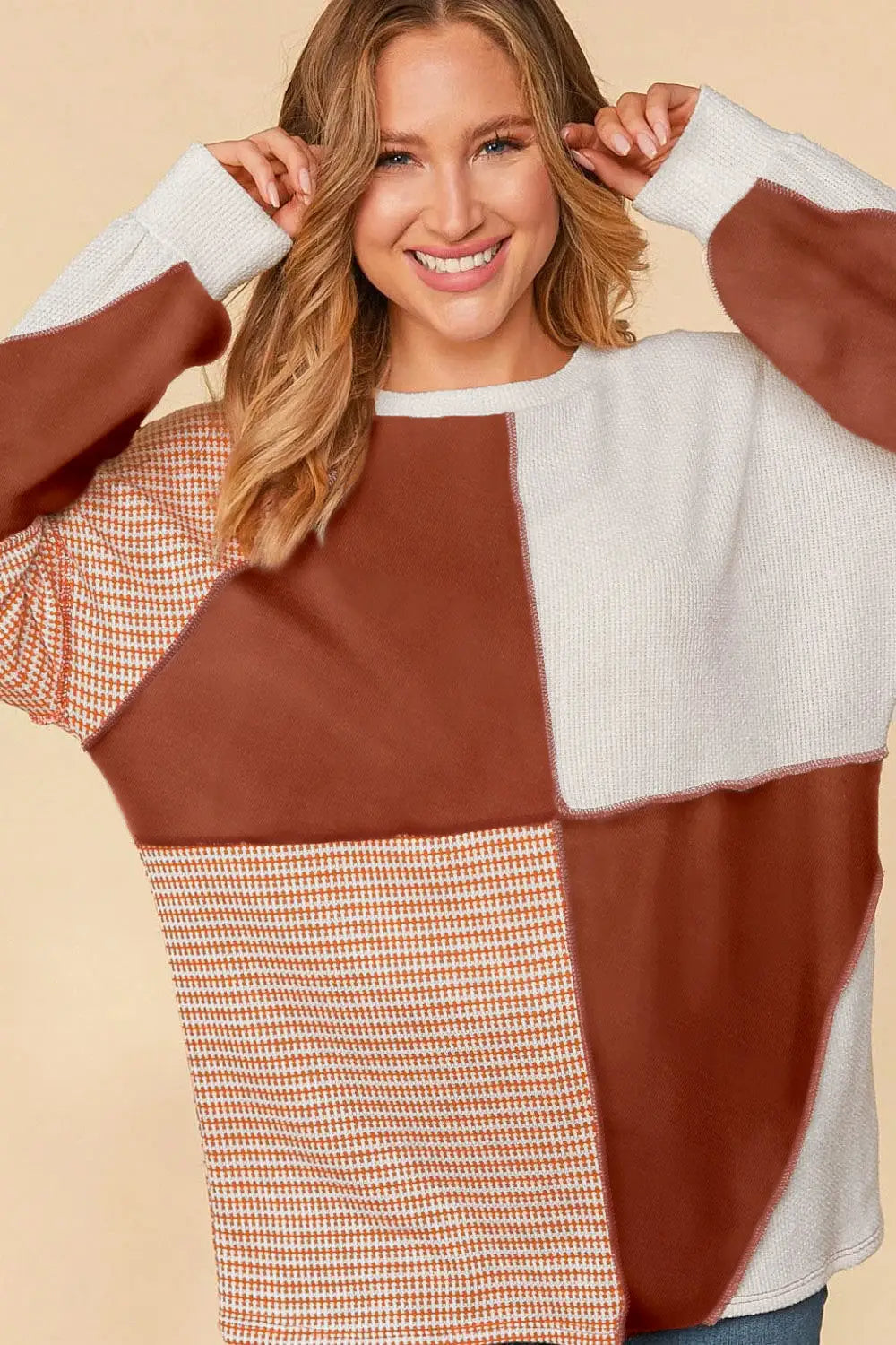 Red sandalwood exposed seam colorblock oversized knit top - long sleeve tops