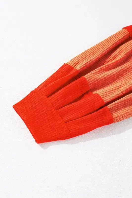 Red Studded V Neckline Exposed Seam Textured Knit Top - Fashionfitz