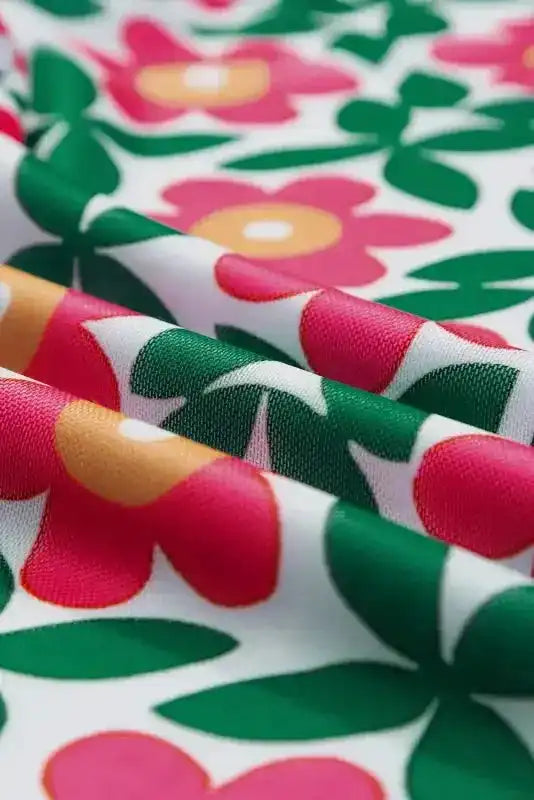 Close-up of Retro Floral Print Slim-Fit Top showing bold fiery red vintage-inspired floral print detail — Fashionfitz