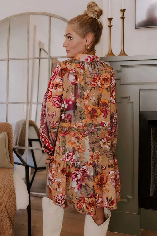 Back view of Retro Floral Ruffle Mini Dress showcasing tiered ruffles and vibrant autumn floral pattern, ideal for seasonal outings.