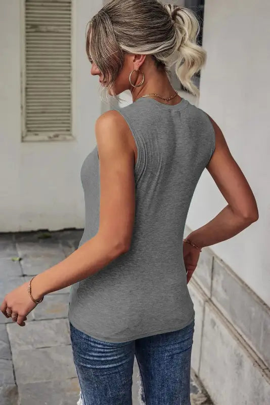 Black rib knit cut-out front twist tank top - tops