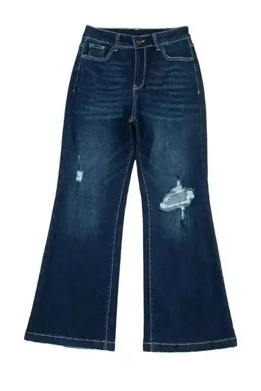 Flat lay of Stylish Ripped Bell Bottom Jeans featuring distressed thigh detail and wide flare silhouette in dark denim.