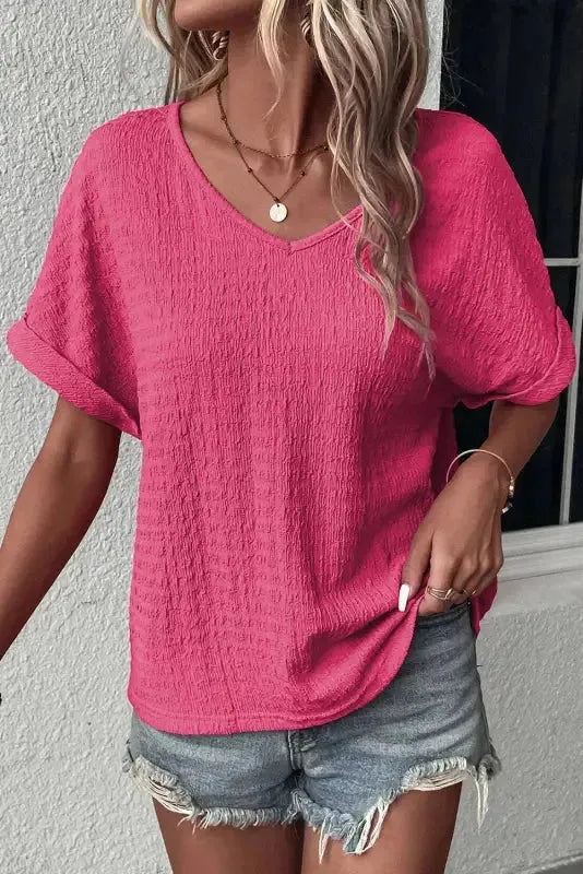 Textured V-Neck Blouse Women UK in bright pink styled as a casual summer outfit — Fashionfitz