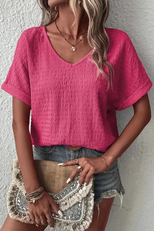 Side view of Textured Rolled Short Sleeve V-Neck Blouse showing shift silhouette and rolled cuff detail — Fashionfitz