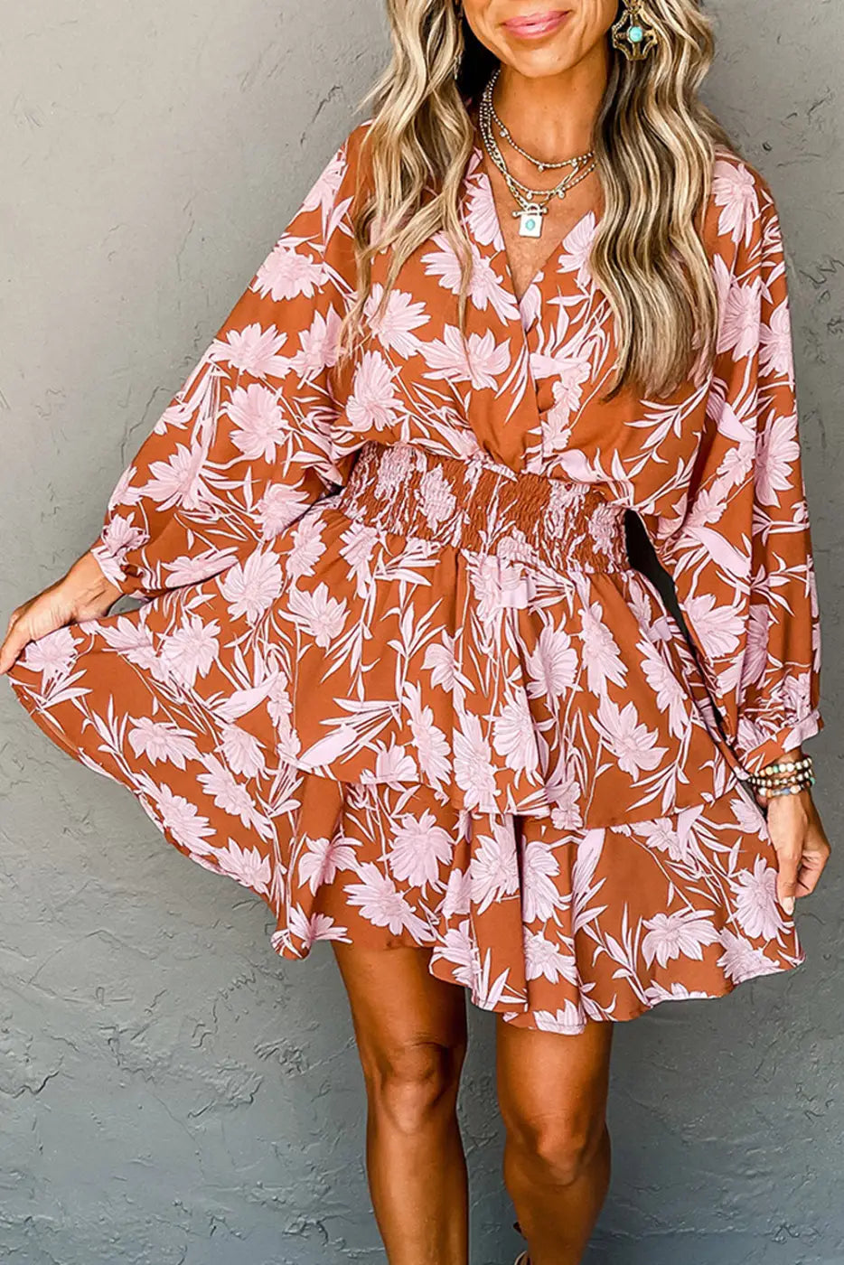 Rosette whimsy smocked dress: floral print wrap dress in rust orange and pink tones