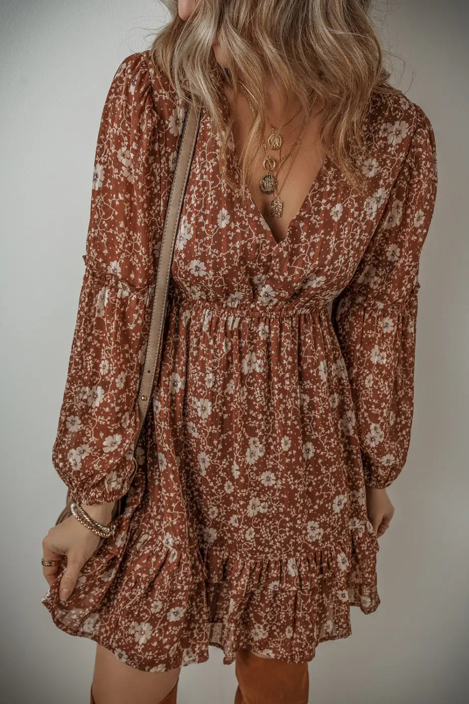 Ruffle romance boho: floral print mini dress with long sleeves, v-neckline, in rust and cream colors