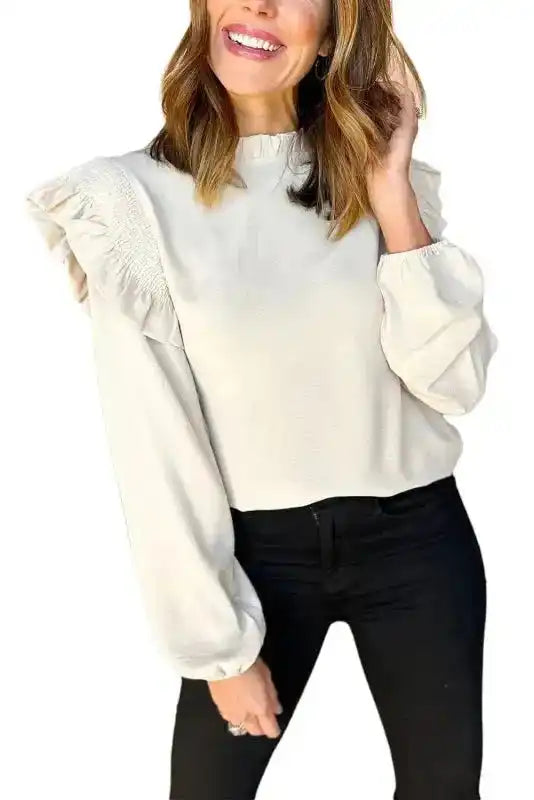 White ruffled trim bubble sleeve blouse for women, featuring a high neckline and elegant silhouette. A best-selling top for stylish fall outfits.