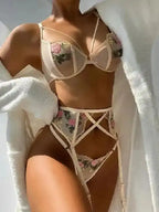 FashionFitz Say My Name - Mesh 3-Pieces Garter Lingerie Set in beige, styled with floral embroidery and seductive sheer mesh fabric.