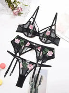 Black Say My Name - Mesh 3-Pieces Garter Lingerie Set with pink floral embroidery, sheer mesh bra, garter belt, and thong for summer fashion.