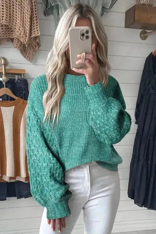 Sea Green Cable Knit Sleeve Drop Shoulder Sweater paired with white pants, highlighting the balloon sleeves and soft knit texture.