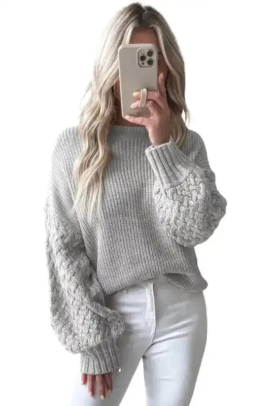 Front view of Sea Green Cable Knit Sleeve Drop Shoulder Sweater with voluminous cable-knit sleeves, styled for a cozy and fashionable daily look.