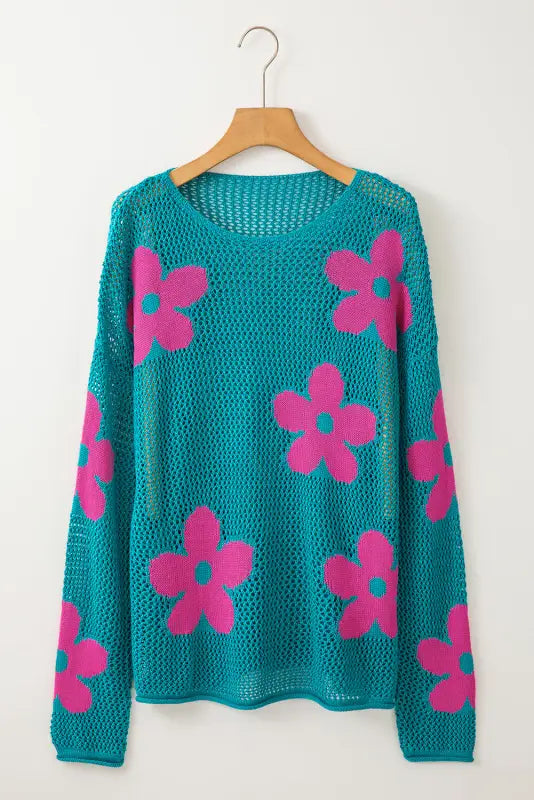 Sea green floral sweater - hollowed knit: teal with pink flowers on wooden hanger. Relax relax