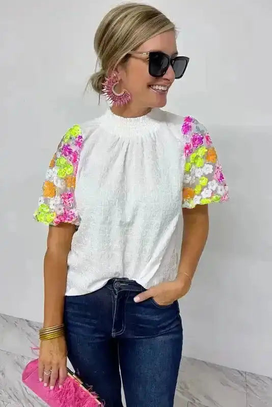 White Sequin Flower Crinkle Smocked Puff Sleeve Top styled as an elegant occasion outfit — Fashionfitz