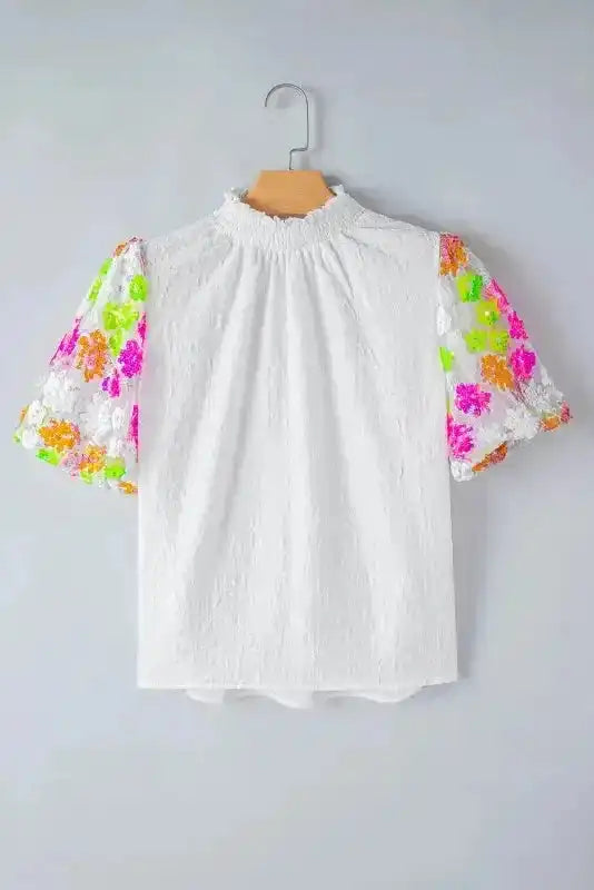 Sequin Flower Puff Sleeve Top on a hanger - Fashionfitz