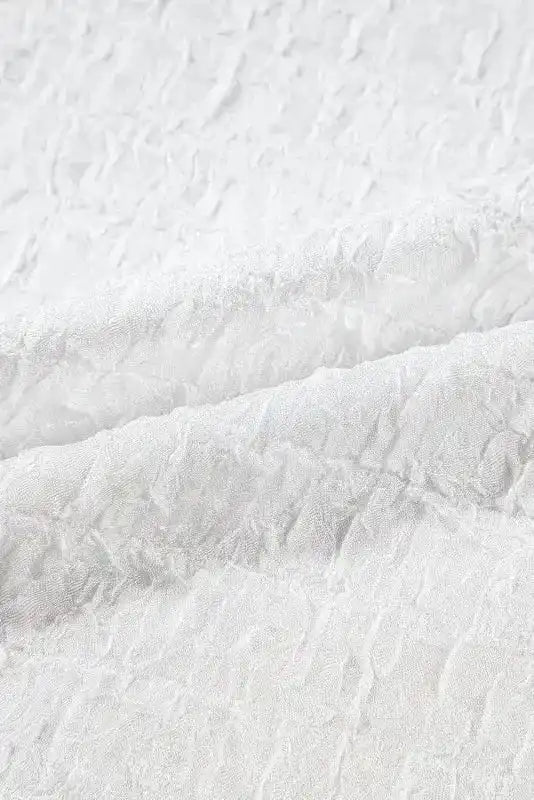 Fabric detail of Sequin Flower Puff Sleeve Top - Fashionfitz