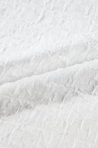 Fabric detail of Sequin Flower Puff Sleeve Top - Fashionfitz