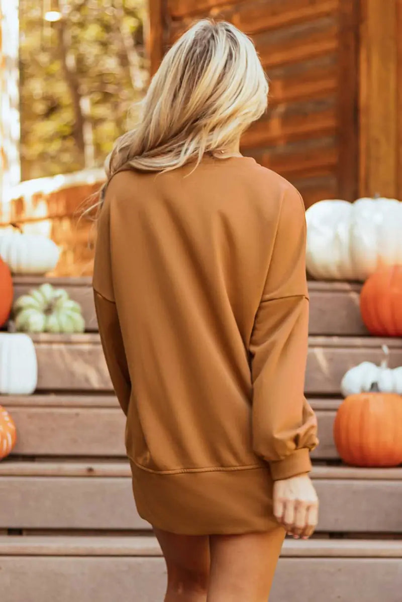 Back view of chestnut Sequin Halloween Graphic Top showing relaxed fit and long sleeves, ideal for cozy autumn style.